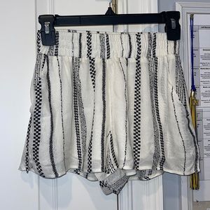 White shorts with black Aztec design